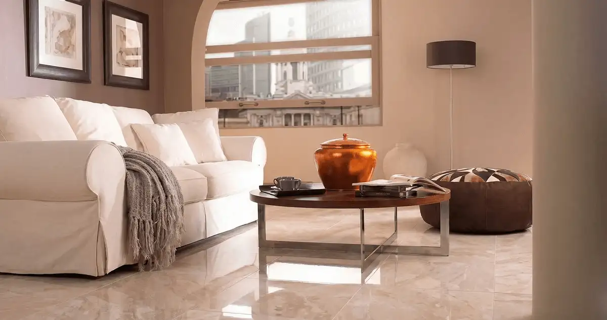 Modern living room with professionally installed marble flooring, a beige sofa, coffee table in Tallahassee, FL