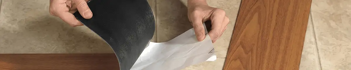 A professional installing vinyl flooring in Tallahassee, FL